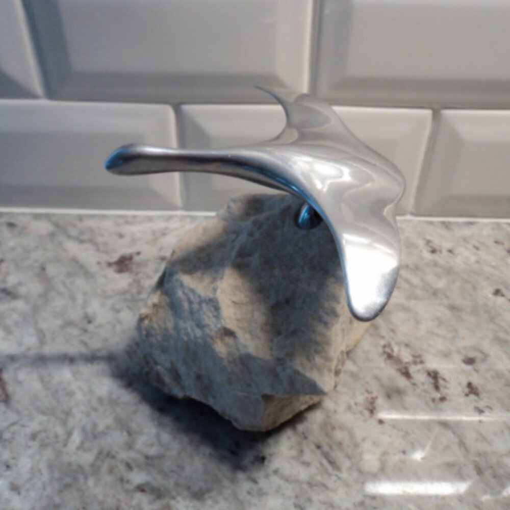 HOSELTON bird figurine on rock